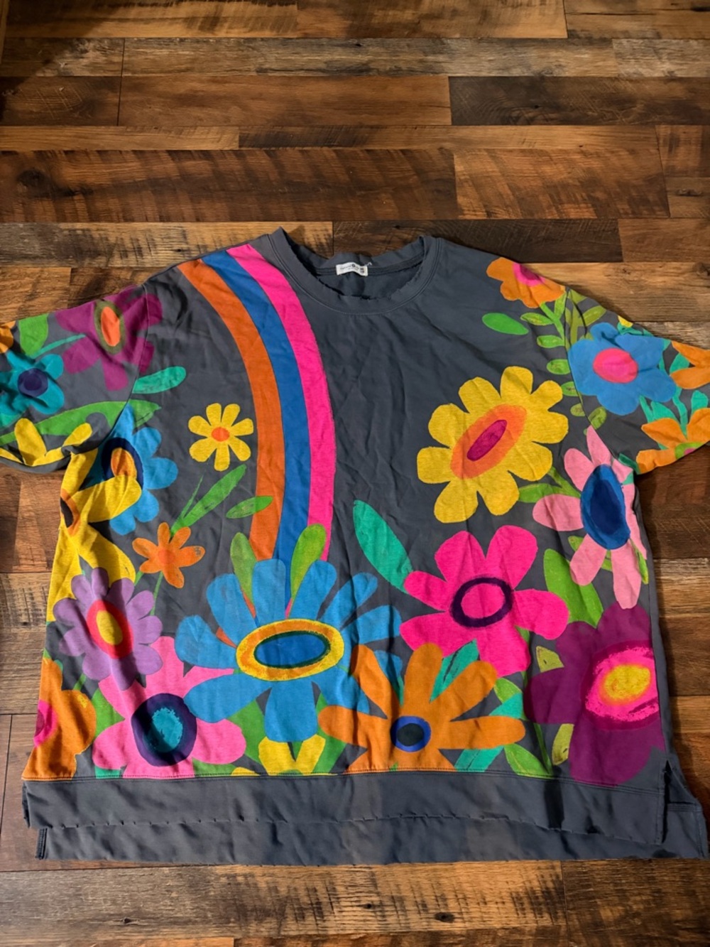 Natural rice, oversized sweatshirt . Gray with Bold Rainbow Floral Print.